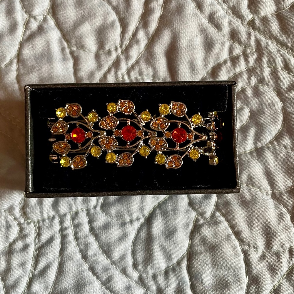 Orange and green crystal floral bracelet